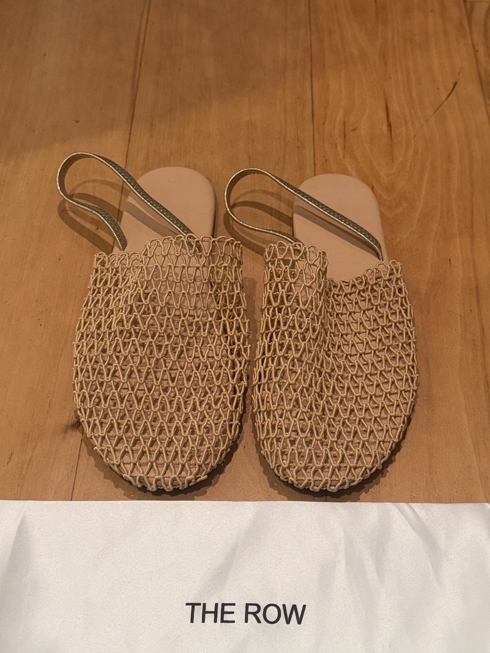The Row woven slingback slides in natural with gold strap size 10/Eur 40